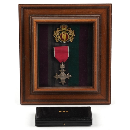 1372 - British military George V silver MBE housed in a glazed display with fitted case and letter from Buc... 