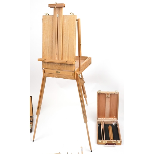 2334 - Good collection of artist's equipment including travelling easels, paint brushes, palettes and paint... 