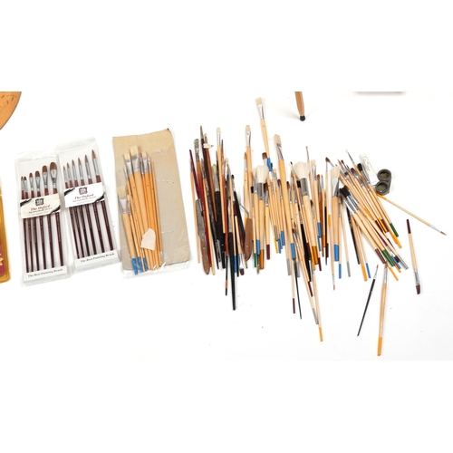 2334 - Good collection of artist's equipment including travelling easels, paint brushes, palettes and paint... 