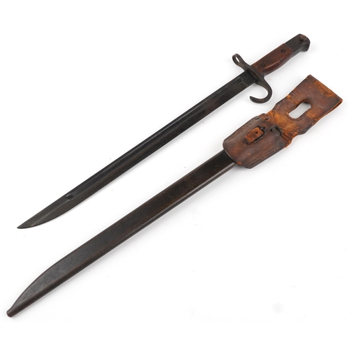 1416 - Military interest bayonet with scabbard and leather frog, 53cm in length