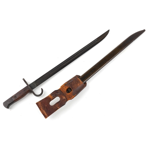 1416 - Military interest bayonet with scabbard and leather frog, 53cm in length