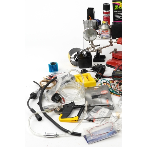 1245 - Collection of radio controlled mechanics and accessories including battery pack, Irvine engine, digi... 