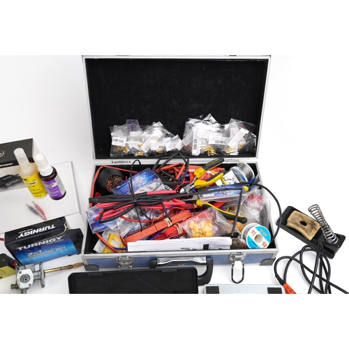 1245 - Collection of radio controlled mechanics and accessories including battery pack, Irvine engine, digi... 