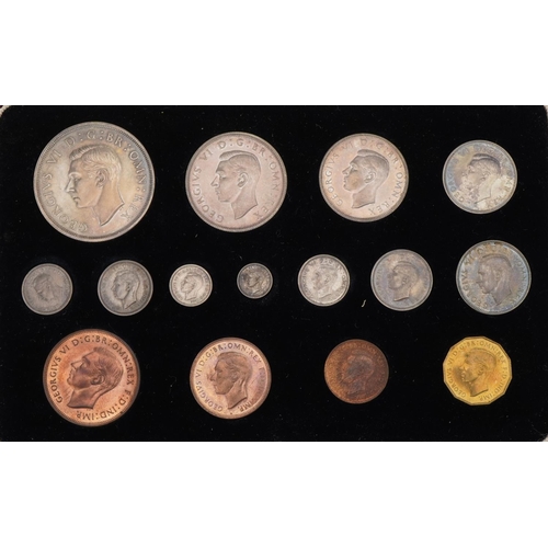 1527 - George VI 1937 specimen coin set housed in a tooled leather silk and velvet lined fitted case by The... 