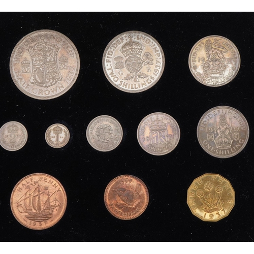 1527 - George VI 1937 specimen coin set housed in a tooled leather silk and velvet lined fitted case by The... 