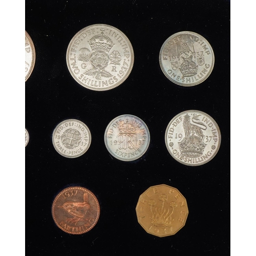 1528 - George VI 1937 specimen coin set housed in a tooled leather silk and velvet lined fitted case by The... 