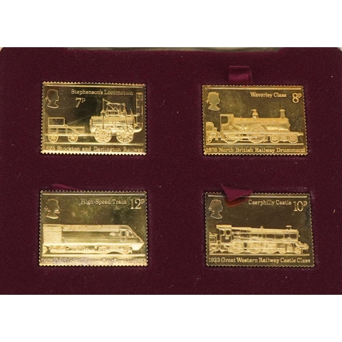 1602 - Set of four gold plated silver Railway Anniversary stamp replicas housed in a fitted case, set numbe... 