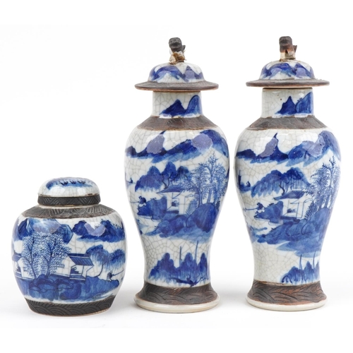 596 - Chinese blue and white crackle glaze porcelain including a pair of lidded baluster vases hand painte... 