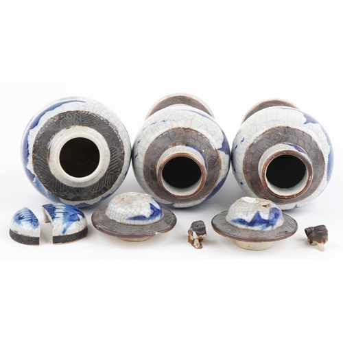 596 - Chinese blue and white crackle glaze porcelain including a pair of lidded baluster vases hand painte... 