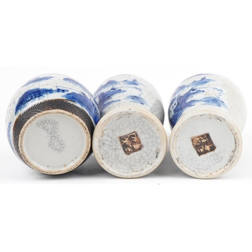 596 - Chinese blue and white crackle glaze porcelain including a pair of lidded baluster vases hand painte... 