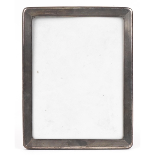 489 - Gorham, large American sterling silver engine turned photo frame, 29cm x 22.5cm