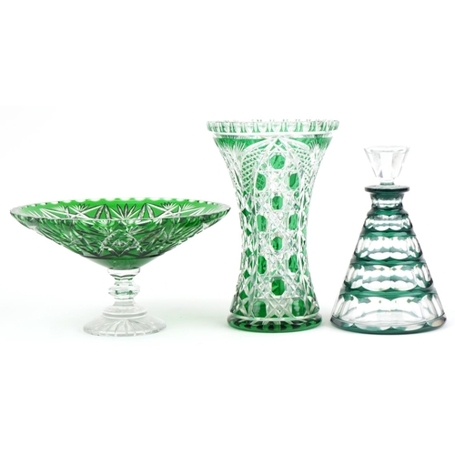 439 - Bohemian green overlaid glassware including a decanter with stopper by Val Saint Lambert, the larges... 