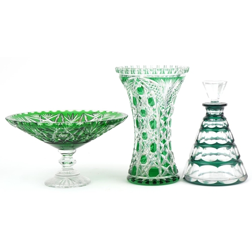 439 - Bohemian green overlaid glassware including a decanter with stopper by Val Saint Lambert, the larges... 