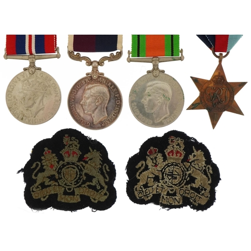 1358 - British military World War II RAF four medal group with two cloth badges including Long Service & Go... 