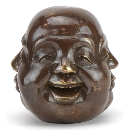 2541 - Chinese patinated bronze four sided Buddha head, character marks to the base, 11cm high