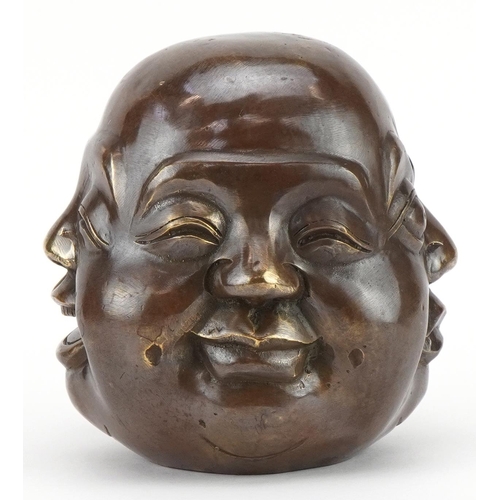 2541 - Chinese patinated bronze four sided Buddha head, character marks to the base, 11cm high