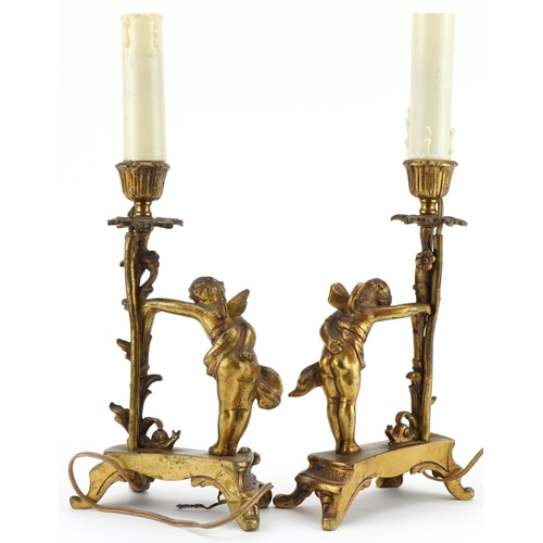 484 - Pair of 19th century French gilt metal Putti and acanthus design candlesticks, each 30.5cm high