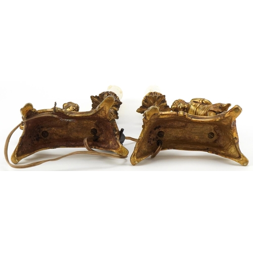 484 - Pair of 19th century French gilt metal Putti and acanthus design candlesticks, each 30.5cm high