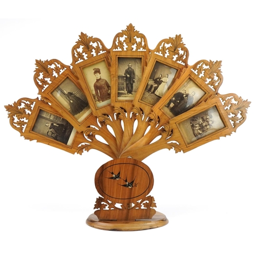 179 - 19th century Italian inlaid Sorento ware olive wood seven section adjustable photo frame in the form... 