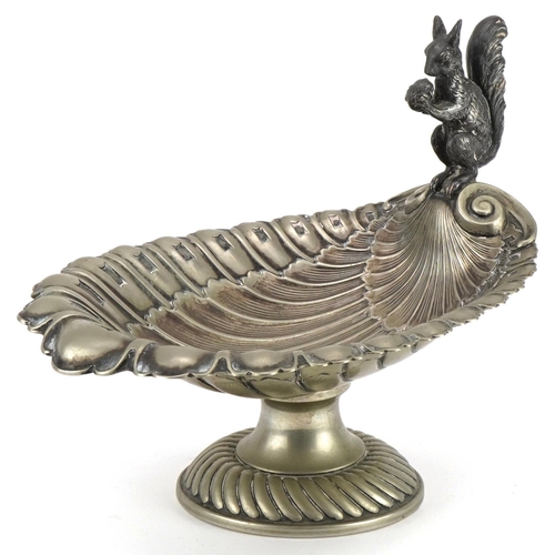 2711 - Silver plate shell design centre piece surmounted with a squirrel holding an acorn, 26.5cm in length