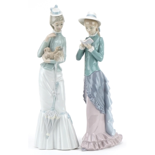 2255 - Two Lladro figurines comprising Walk with the Dog 4893 and Girl reading book 5000, the largest 37.5c... 