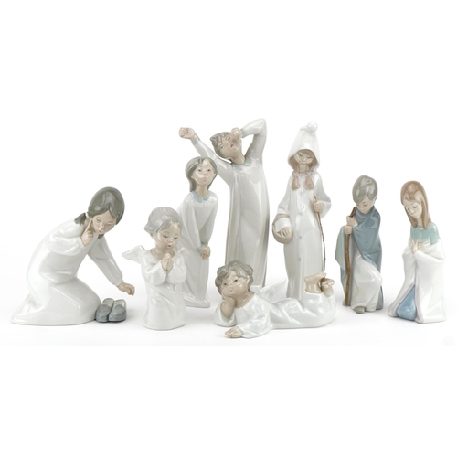 2257 - Eight Lladro angels and sleepy children including Morning Boy, the largest 21cm high