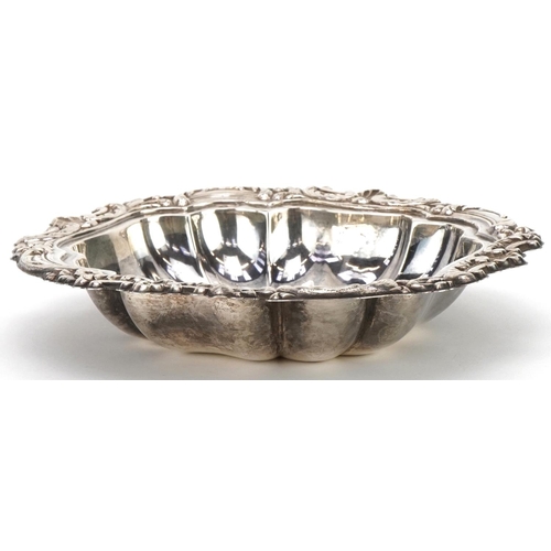 327 - Spanish silver bowl embossed with scrolling foliage, 22.5cm wide, 170.5g