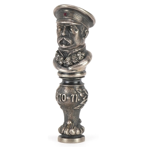 493 - Silver desk seal in the form of a Russian officer in uniform set with a cabochon ruby and clear ston... 