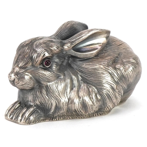 403 - Silver recumbent rabbit with cabochon ruby eyes, impressed Russian marks to the base, 6.5cm in lengt... 