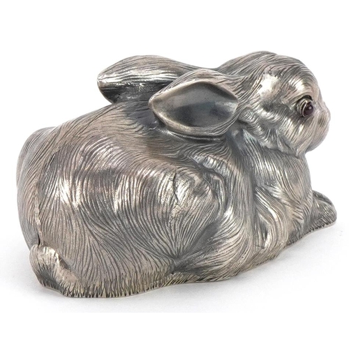 403 - Silver recumbent rabbit with cabochon ruby eyes, impressed Russian marks to the base, 6.5cm in lengt... 