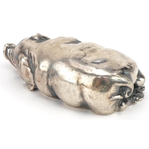 271 - Silver recumbent pig with cabochon ruby eyes, impressed Russian marks to the base, 7cm in length, 42... 