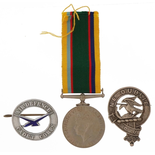 1360 - British military George VI Cadet Forces medal and two badges, the medal awarded to ACT.SQN.LDR.H.B.H... 