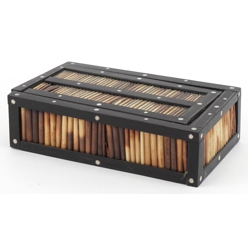 2529 - Anglo Indian ebony and porcupine quill box with slide lid, 5cm H x 17cm W x 7cm D