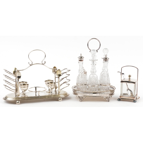 2381 - Silver plated items including a Walker & Hall cruet stand with six cut glass jars and an Art Deco pr... 