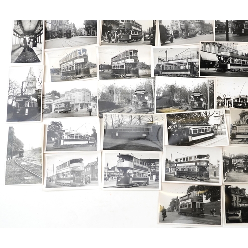 1714 - Collection of Mid 20th century tram black and white photographs, predominantly of London, each with ... 