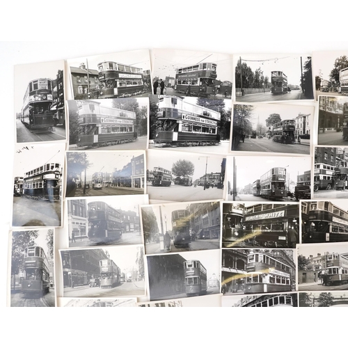 1718 - Collection of Mid 20th century tram black and white photographs, predominantly of London, each with ... 