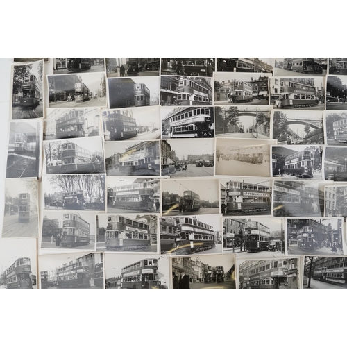 1718 - Collection of Mid 20th century tram black and white photographs, predominantly of London, each with ... 