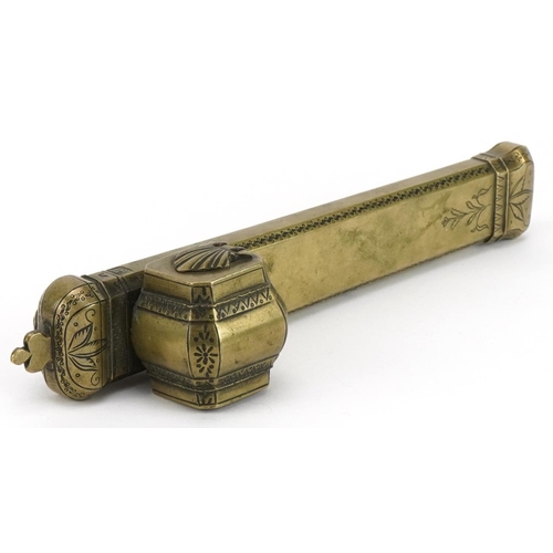 285 - Islamic brass divit pen box engraved with flowers, impressed with calligraphy, 25.5cm in length