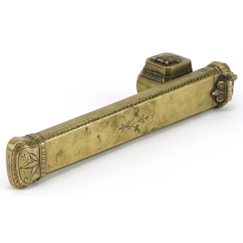 285 - Islamic brass divit pen box engraved with flowers, impressed with calligraphy, 25.5cm in length