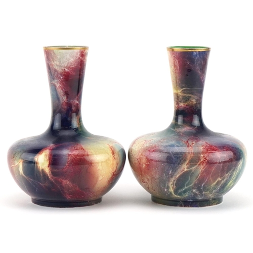 81 - Pair of Wilkinson's Oriflamme lustre vases designed by John Butler, each 16cm high