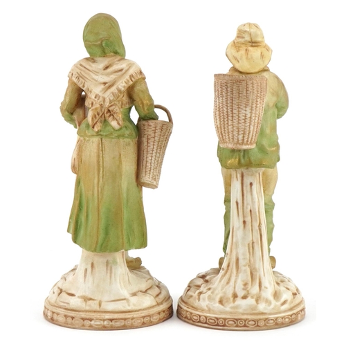 149 - Ernst Wahliss for Royal Vienna, pair of Austrian Art Nouveau porcelain figures of peasants, the larg... 