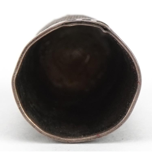 705 - Victorian brass thimble case in the form of an acorn housing a silver thimble, the case 4.5cm high