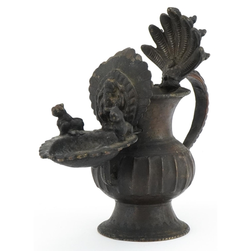 96 - Antique Nepalese bronze oil lamp, 18cm high