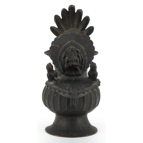 96 - Antique Nepalese bronze oil lamp, 18cm high