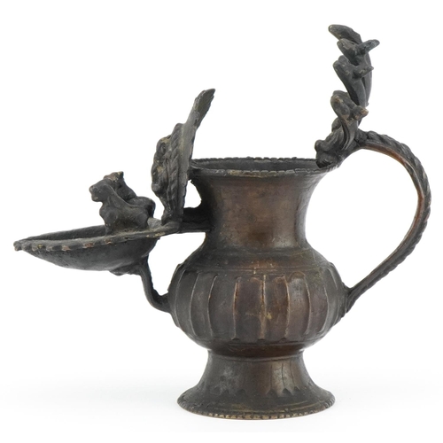 96 - Antique Nepalese bronze oil lamp, 18cm high