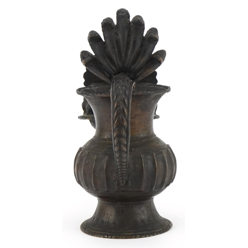 96 - Antique Nepalese bronze oil lamp, 18cm high