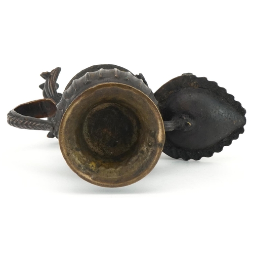 96 - Antique Nepalese bronze oil lamp, 18cm high