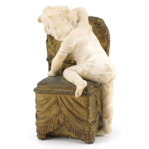 544 - Art Deco onyx and gilt spelter sculpture of a young child climbing onto a chair, impressed Delaunay ... 