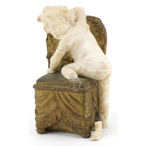 544 - Art Deco onyx and gilt spelter sculpture of a young child climbing onto a chair, impressed Delaunay ... 