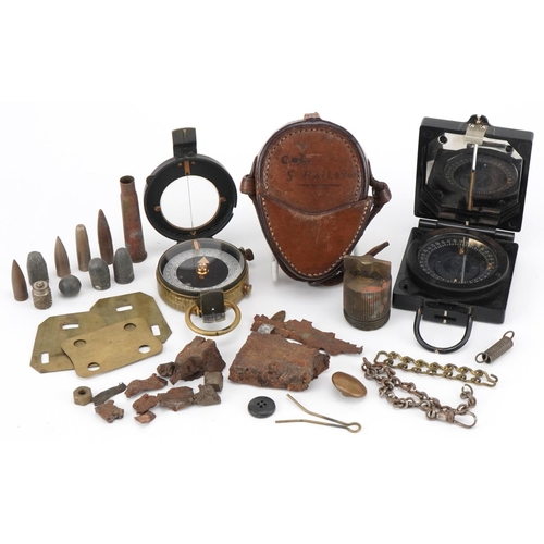 1400 - Militaria including two military issue compasses, one World War I Anglo-Swiss Association example wi... 